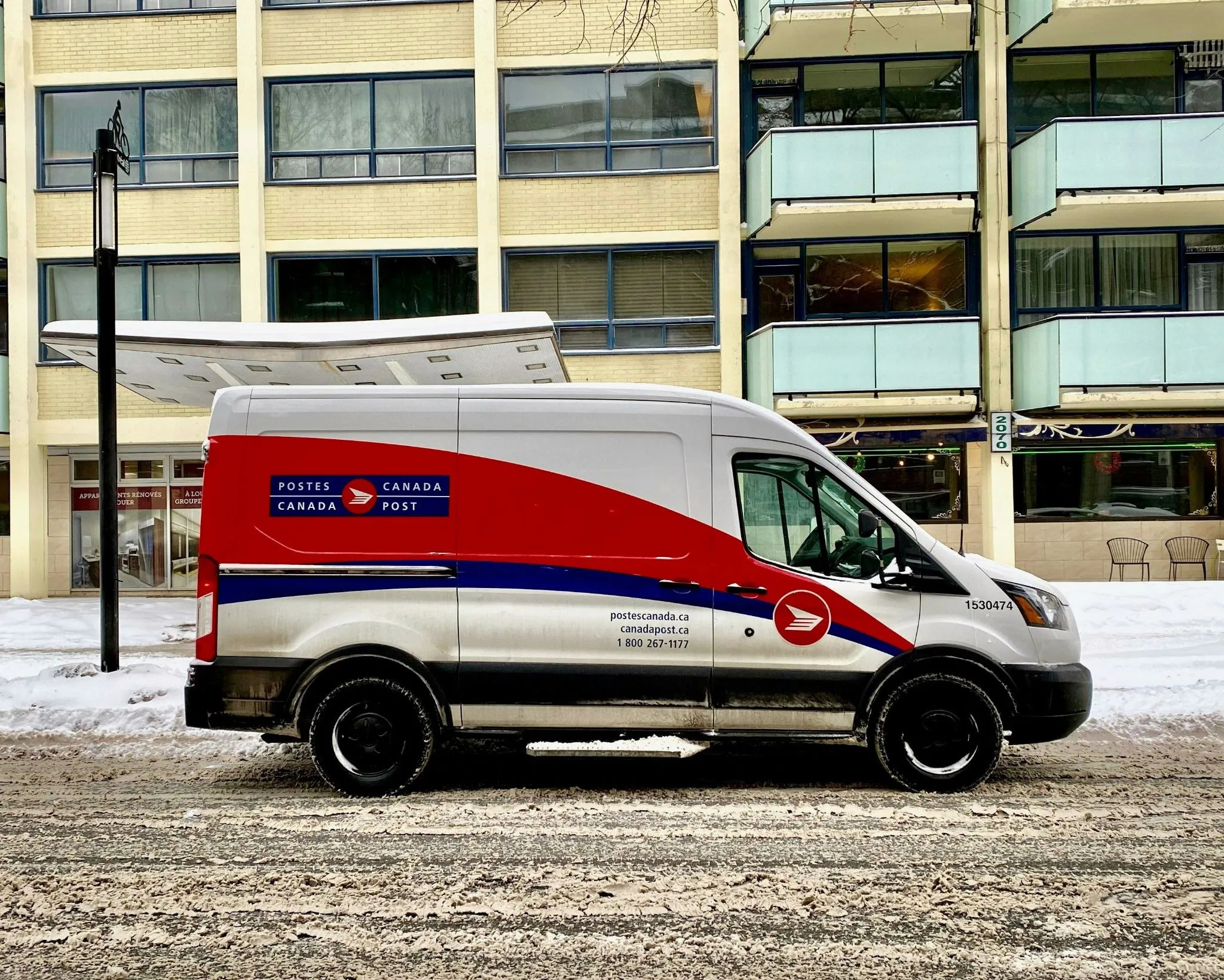 Module Masters delivery van in Calgary — mail-in module repair shipping across Canada